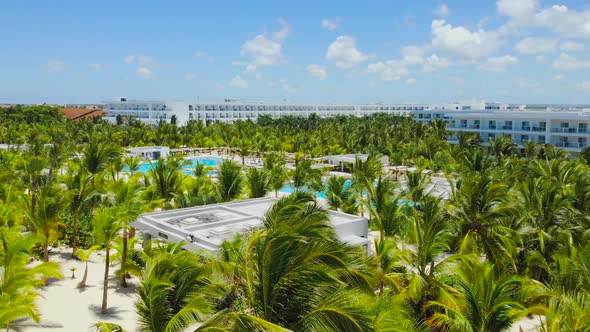 Aerial View of Tourists Enjoying Tropical Resort in Pool