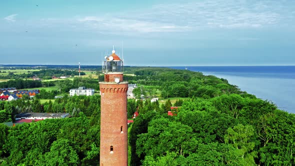 Aerial view of lighthouse by Baltic Sea in Poland