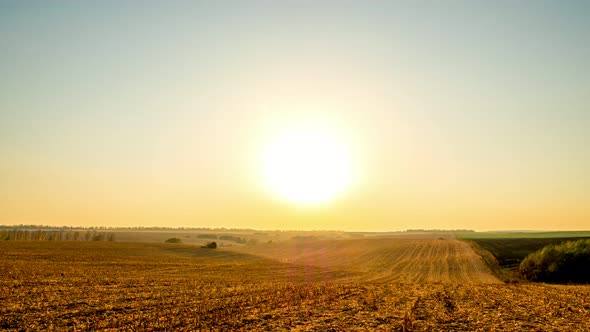 Sunset on Autumn Corn Field. Time Lapse