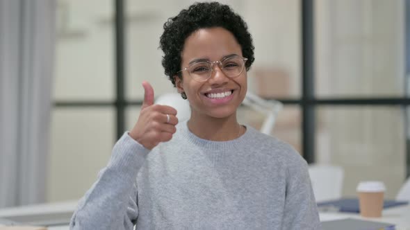 Portrait of Young African Woman Showing Thumbs Up Sign 