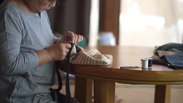 woman making a bag