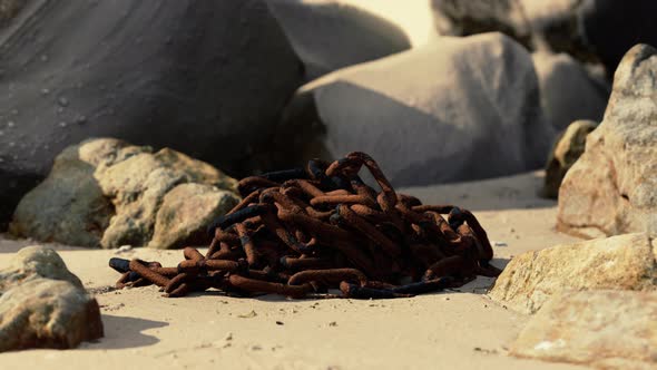 Old Rusted Chain in the Sand