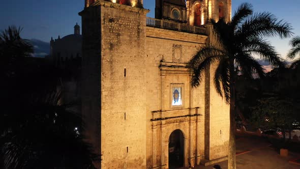 Aerial ascending nighttime extreme closeup of the towers of the Cathedral de San Gervasio in Vallado