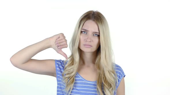 Thumbs Down By Beautiful Woman, White Background