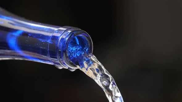 Water Pouring From a glass Bottle