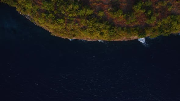 Top Down View on Coast in Bali on Sunset