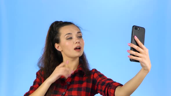 Lady Making Selfie and with Duckface on Her Phone