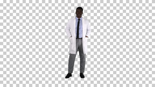 Male African Doctor Standing With Hands In His Pockets