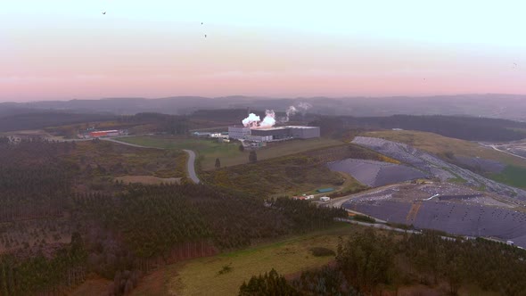 Aerial Flying Towards Waste Treatment Incinerator Plant In Spain. Dolly Forward