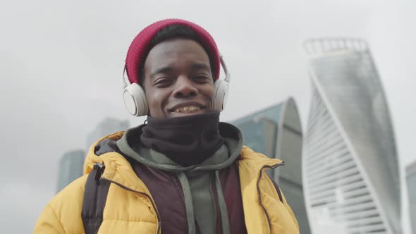 Portrait of Man Listening to Music Outdoors