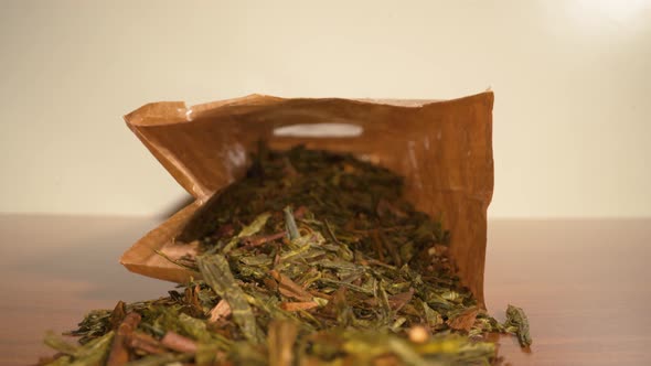 Green Tea Scattered on the Table