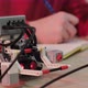 Close Up of an Young Man That is Learning Robotics Lessons Using Computer - VideoHive Item for Sale