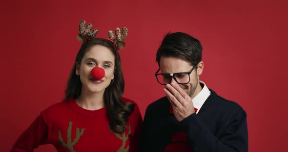 Shy man and his girlfriend at Christmas