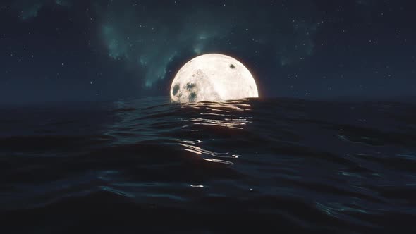 Moon Floating in the Ocean: Celestial Beauty Over the Waves