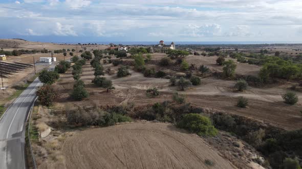 Flight of the camera over the scenic area. The sea is visible in the distance.