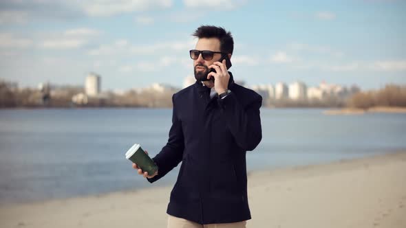 Happy Mobile Worker Talking On Mobile Phone With Friend Office Outdoor.Man Talking Smartphone On Sea