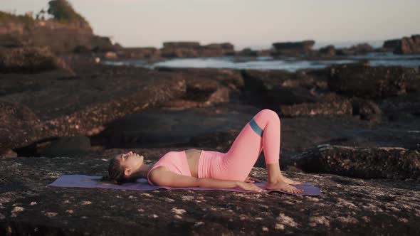 Sporty Woman's Workout at the Seashore