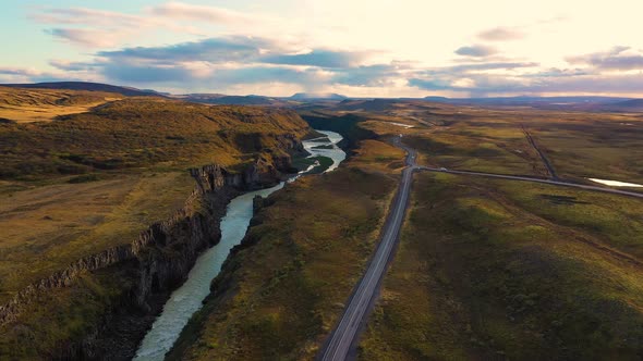 Aerial View of a Road in Iceland Going Along the Olfusa River