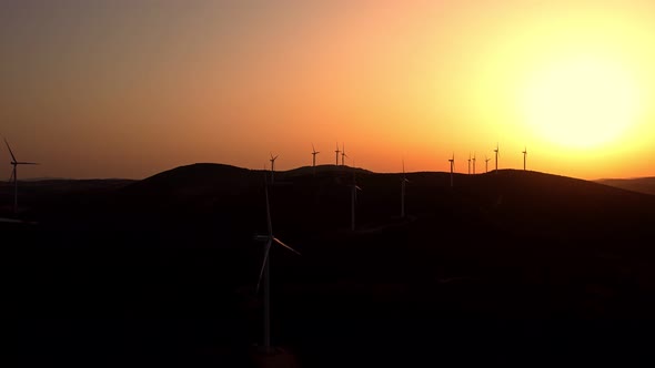 Windmills At Sunset