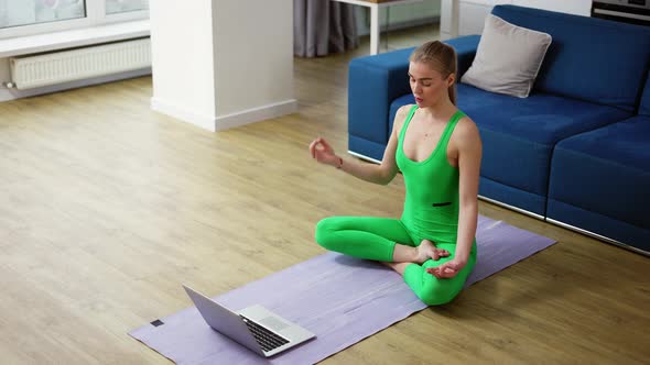 Woman at Home Talk on Video Call Sit on Yoga Mat