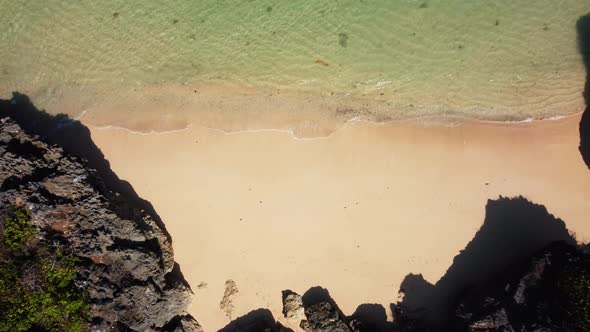 Birds Eye View on Small Beach Between Cliffs