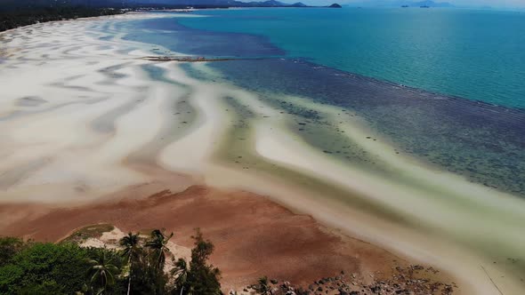Unusual Coast of White Sand. Breathtaking Landscape of Sandy Wavy Seaside. Paradise Islands in Asia