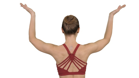 Woman Doing Yoga Lotus Pose with Hands Coupled on White Background