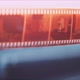 Close up of a film strip, showing a portrait of a man - VideoHive Item for Sale