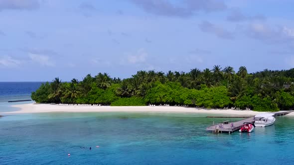 Aerial panorama of coast beach time by blue ocean with sand background