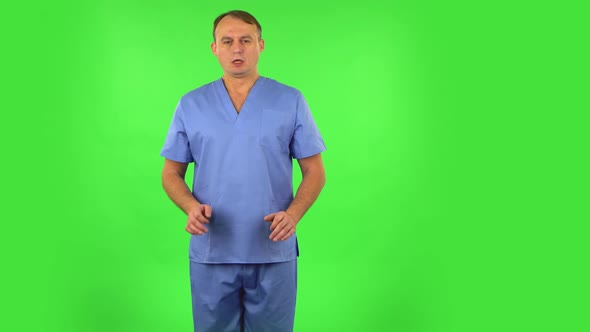 Medical Man Refuses Stress and Takes Situation, Calms Down, Breathes Deeply. Green Screen