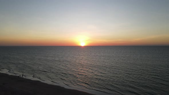 Still Aerial Drone shot of Orange Sunset and Blue Ocean at Lee Point Beach in Darwin, Northern Terri