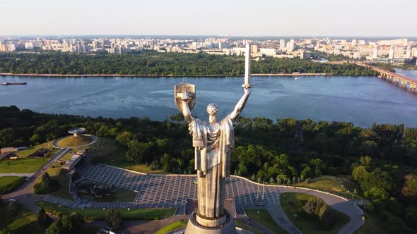 Aerial View of glorious The Motherland Monument located on the banks of Dnieper River