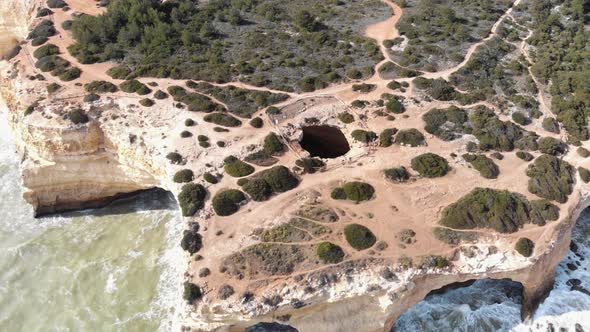 Benagil Cave, Atlantic sea waves washing on the cliffs, Lagoa, Algarve, Portugal