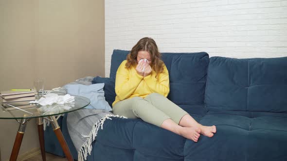 Woman Sneezes and Blows Her Nose in Handkerchief She Has Cold Flu Pandemic Infection