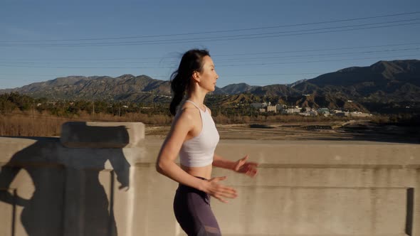 Attractive asian woman going for her morning run alt