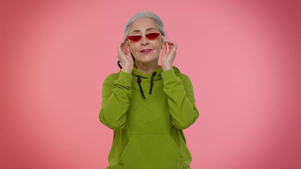 Portrait of Seductive Senior Elderly Old Granny Grayhaired Woman Wearing Sunglasses Charming Smile