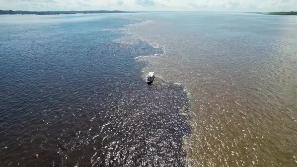 Famous Meeting of the Waters tourism landmark at Manaus Brazil.