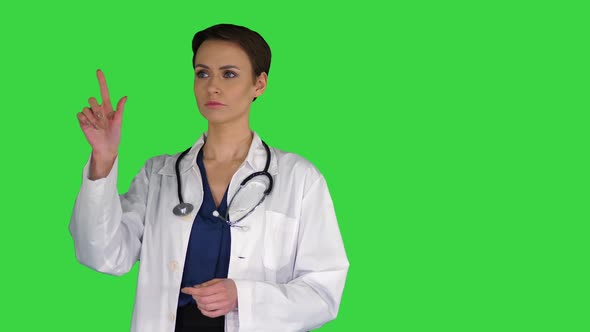 A Futuristic Young Pharmacist Uses Virtual Screen on a Green Screen, Chroma Key