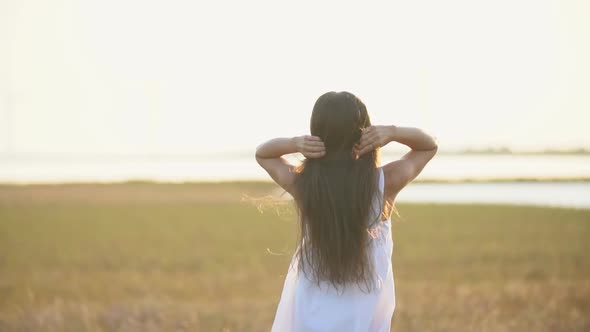 Woman with Long Hair Walking