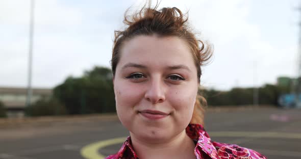 Young woman looking on camera