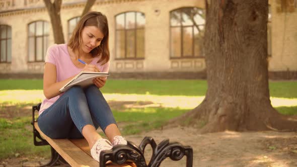 Young Woman Study Near College