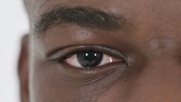 One Blinking Eye of African Man