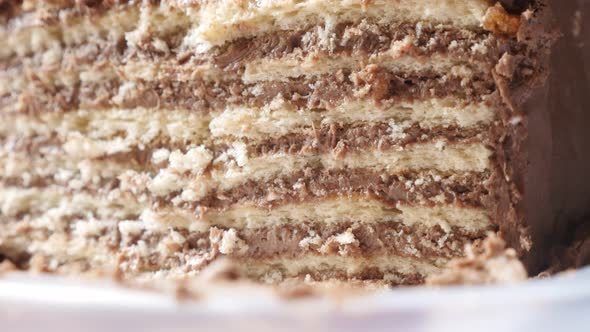 Layers of tasty torte with biscuits 4K 2160p 30fps UltraHD tilting footage - Creamy  chocolate cake 