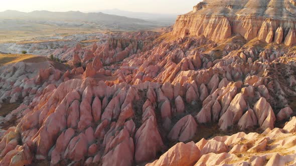 Cappadocia Aerial Drone View to Red and Rose Valley Rocks Goreme Turkey