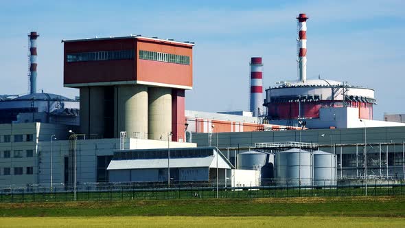 Factory (Nuclear Power Station) - Closeup of Buildings and Chimneys - Closeup