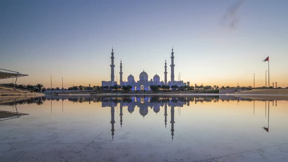 Sheikh Zayed Grand Mosque in Abu Dhabi Day to Night Timelapse After Sunset UAE