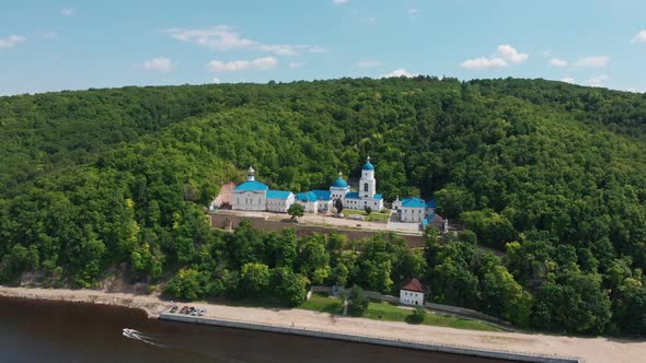 Makaryev Monastery in Russia Surrounded By Green Forest Placed Near the River