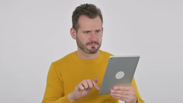 Portrait of Middle Aged Man Having Loss on Tablet in Office