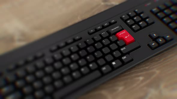 Attack red button on keyboard. A finger presses Enter. Click Attack. Realistic keyboard button. Wide