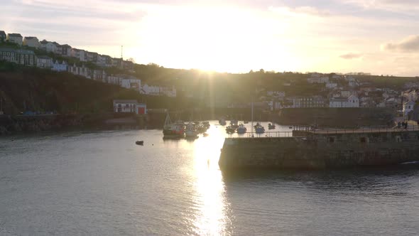 Boats in Mevagissey Harbour in Cornwall at Sunset